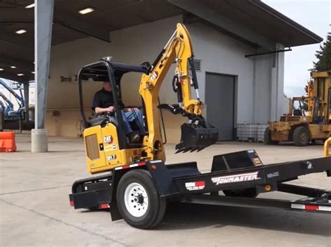 mini excavator on trailer stuck in the ground|moving disability mini excavators.